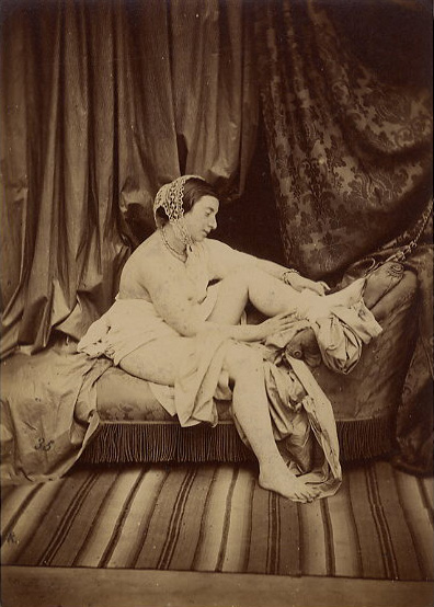 Auguste Belloc - Female Nude Taking off Stocking on Chaise Lounge