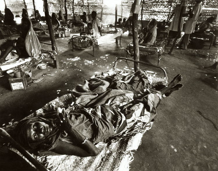 Barry Thumma - Woman Lies near Death from Famine in Ethiopia
