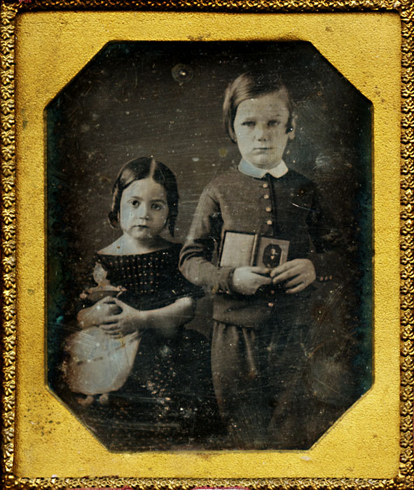 Anonymous - Brother and Sister Displaying a Daguerreotype of Their Dead Father