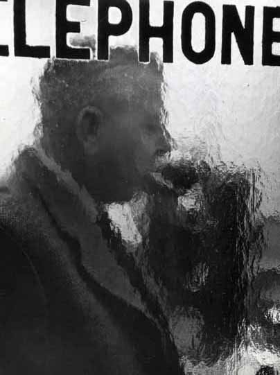 Jacques Prévert in a Telephone Booth