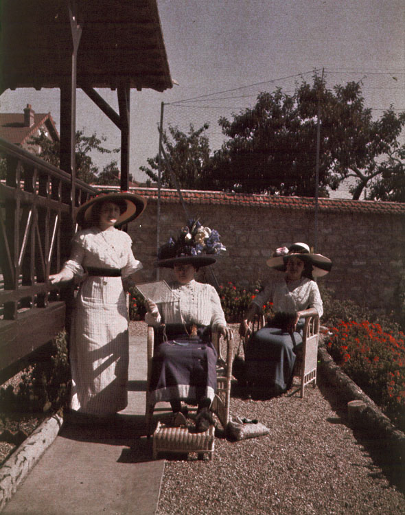 Anonymous - Three Women in Hats in a Garden