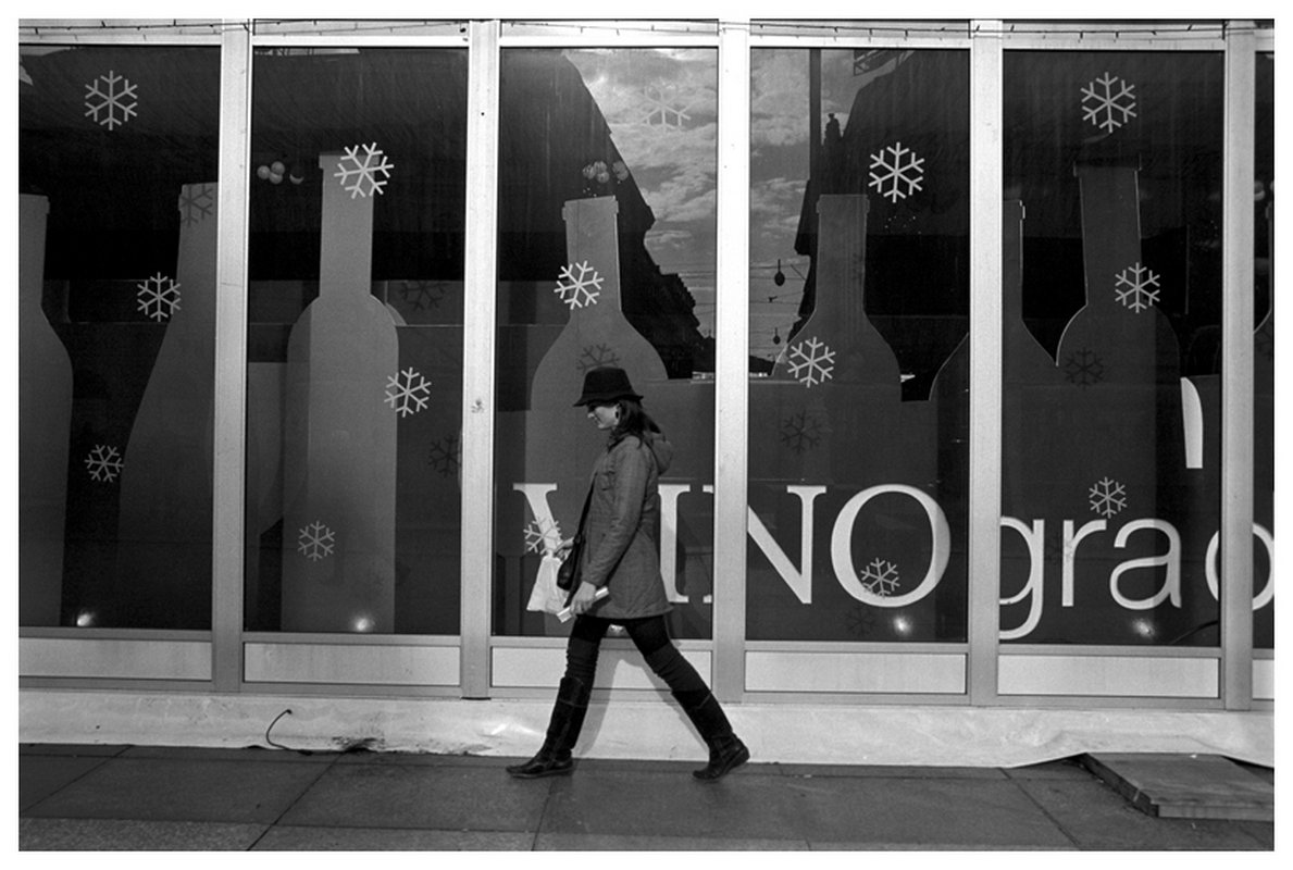 Stanko Abadžic - Woman in Front of Snowflake Window Display, Zagreb,Croatia Stanko Abadžic - Woman in Front of Snowflake Window Display, Zagreb,Croatia