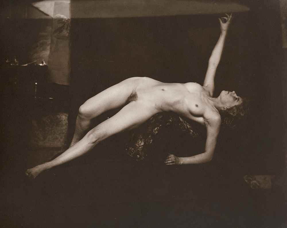 Undraped Reclining Female Nude Pointing Upwards