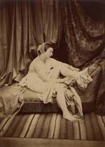 Auguste Belloc - Female Nude Taking off Stocking on Chaise Lounge