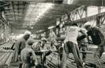 Henri Cartier-Bresson - Factory Workers with Drill, China