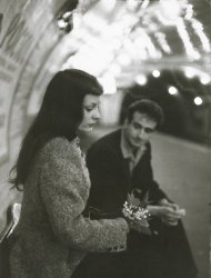 Robert Doisneau - "Le Muguet du M�tro" (Marc and Christiane Chevalier in the Paris Metro)