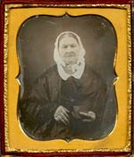 Anonymous - Old Woman Wearing a Bonnet, Holding a Daguerreotype