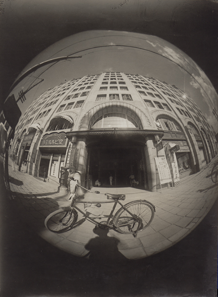 Osaka Asahi Shinbun - The Doshima Building, Osaka, as Seen Through Early Prototype of the Fisheye Lens