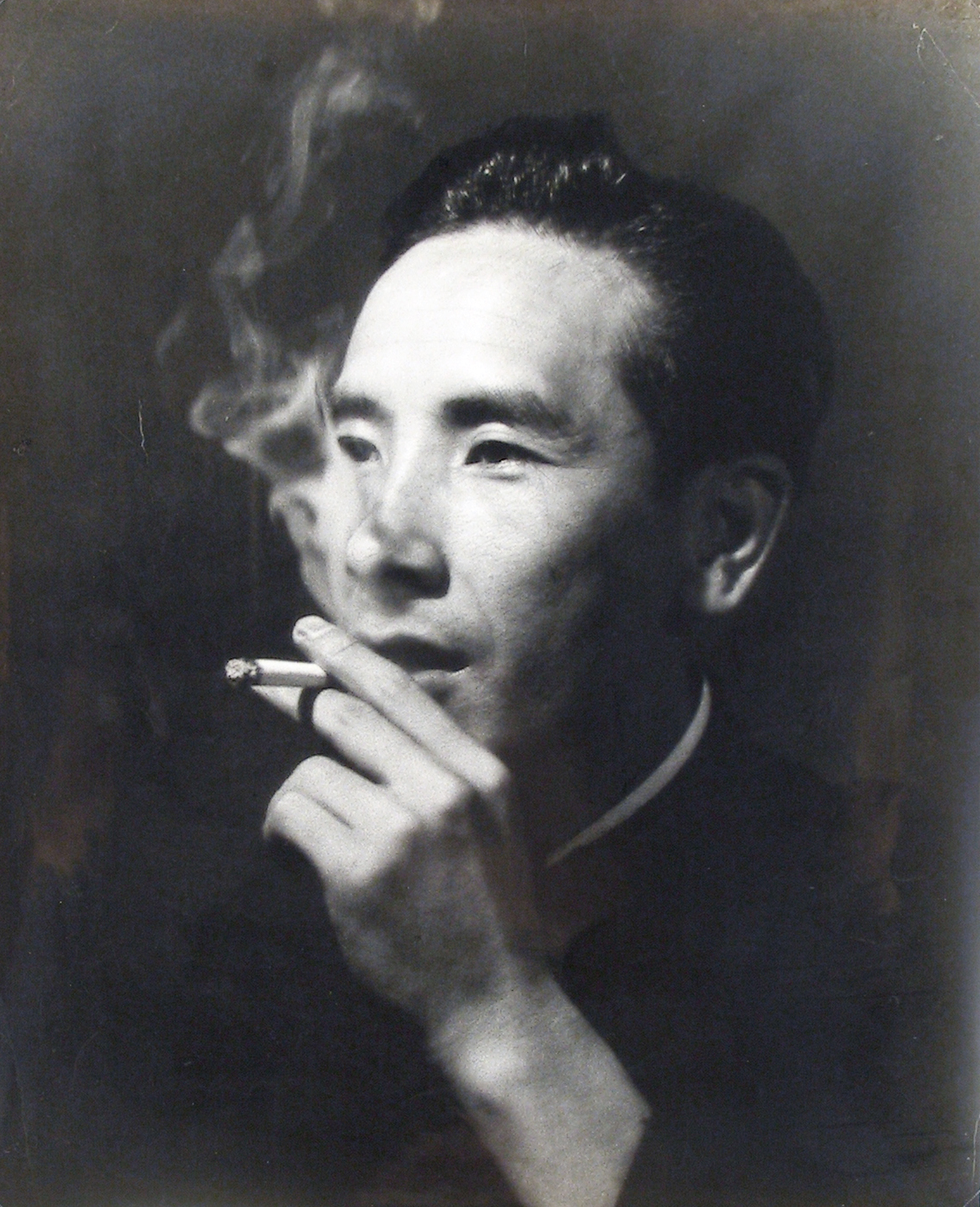 Untitled (portrait of man smoking)