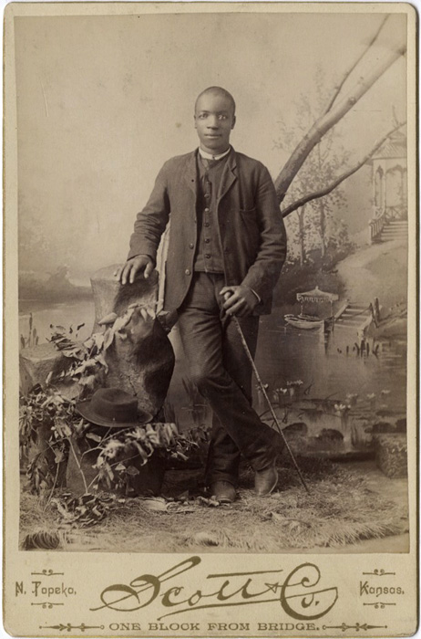 Young African American Man Holding a Cane.