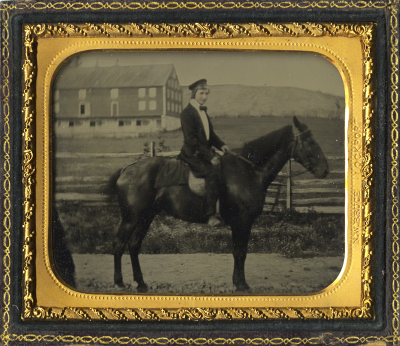 Outdoor Portrait of a Young Man on Horseback