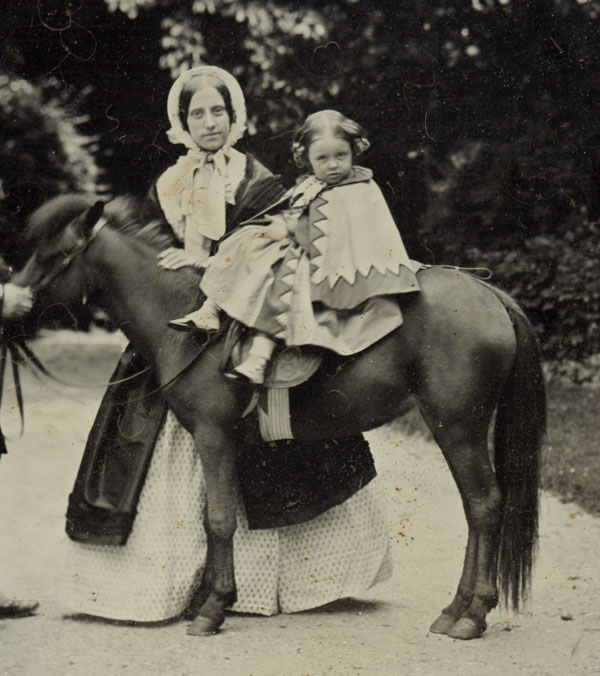 Anonymous - Little Girl on Pony with Man and Woman Standing Alongside