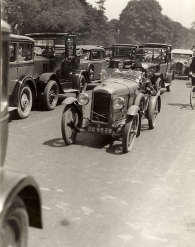 Germaine Krull - Parade of Cars, Avenue de Bois, Paris Germaine Krull - Parade of Cars, Avenue de Bois, Paris