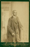 Anonymous - Cabinet Card of a Young African American Man with Walking Stick And Cigarette