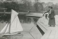 George Grantham Baine - Woman Launches a Toy Yacht in Central Park, New York City