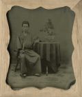 Yokoyama - Studio Portrait of Seated Man Holding a Fan