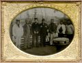 Anonymous - A Captain and Six Crew Members Standing on Ship Deck