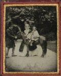 Anonymous - Little Girl on Pony with Man and Woman Standing Alongside