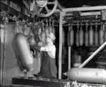 Shafer - Workman Hangs Bombs on Paint Conveyor Line At Christy Park Works, McKeesport, PA.  Part of U.S. Steel's National Tube Company