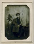 Naka [Name Incomplete] - Portrait of Young Man With Bonsai and Book