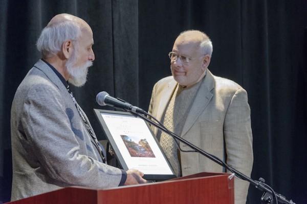 Stephen Perloff presents Anthony Bannon with Photo Review's Lifetime Award.