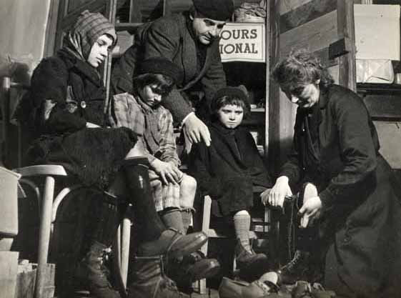 Robert Doisneau - Trying on New Shoes