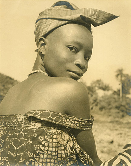 African Woman Looking Over Her Bare Shoulder