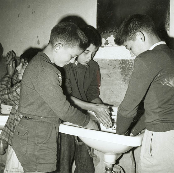 Group of Ten Prints of Children Playing, Washing up