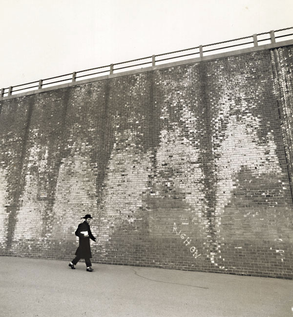 Arthur Tress - A Hassidic Rabbi Walks across a Highway Underpass, Brooklyn, NY