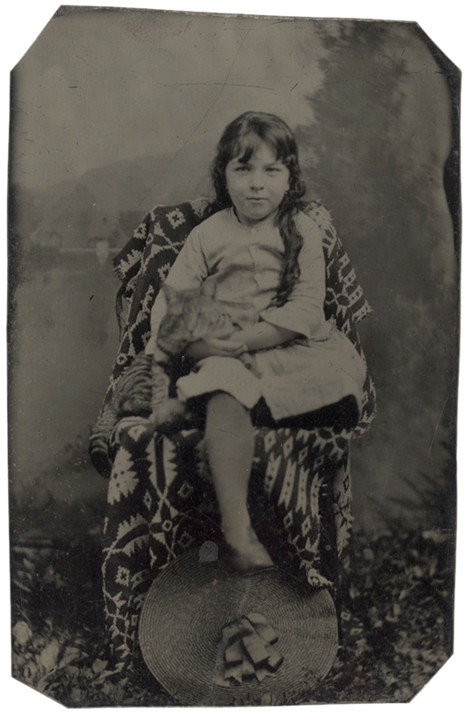 Girl Seated with her Cat