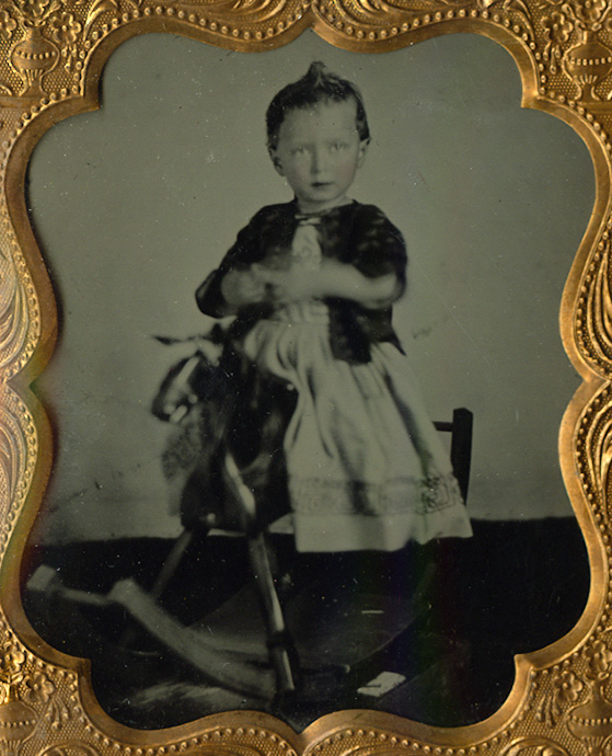 Meade Brothers Exchange - Portrait of a Girl Seated on a Rocking Horse Meade Brothers Exchange - Portrait of a Girl Seated on a Rocking Horse