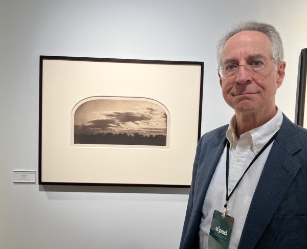 Han P. Kraus, Jr. in front of Roger Fenton study of clouds. (Photo by Michael Diemar)