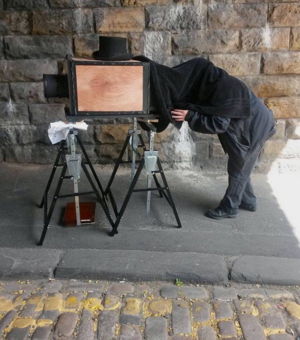 Ambrotypist Jonathan Keys at work.