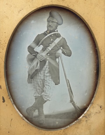 Half-plate daguerreotype of a hunter.