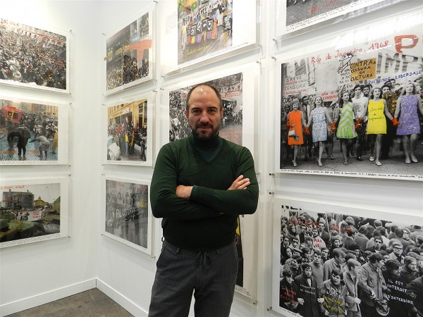 Henrique Faria in front of Marcelo Brodsky's "1968 - The Fire of Ideas". (Photo by Michael Diemar)