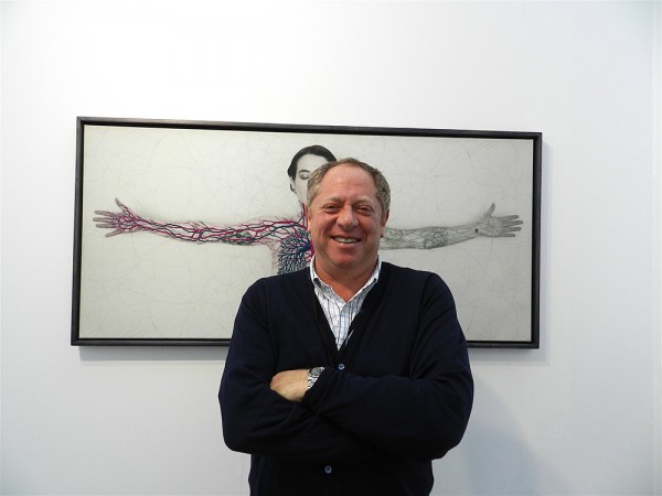 London Dealer Michael Hoppen, with embroidered photograph by Juana Gòmez. (Photo by Michael Diemar)