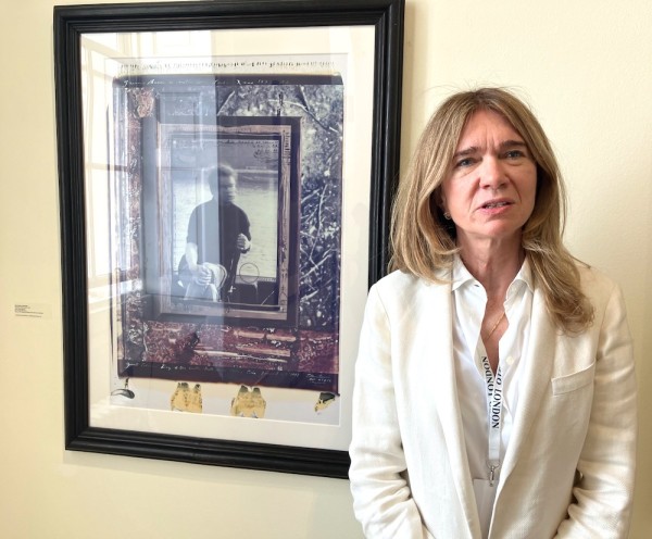 Sophie Scheidecker with portrait of Francis Bacon by Peter Beard. (Photo by Michael Diemar)