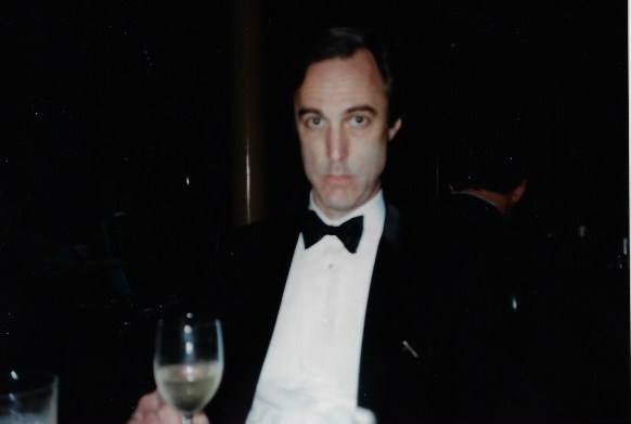 An early photo of Tom Halsted "trying to look serious at the opening of the Center for Creative Photography in Tucson in 1989", as friend and fellow dealer Stephen White put it.